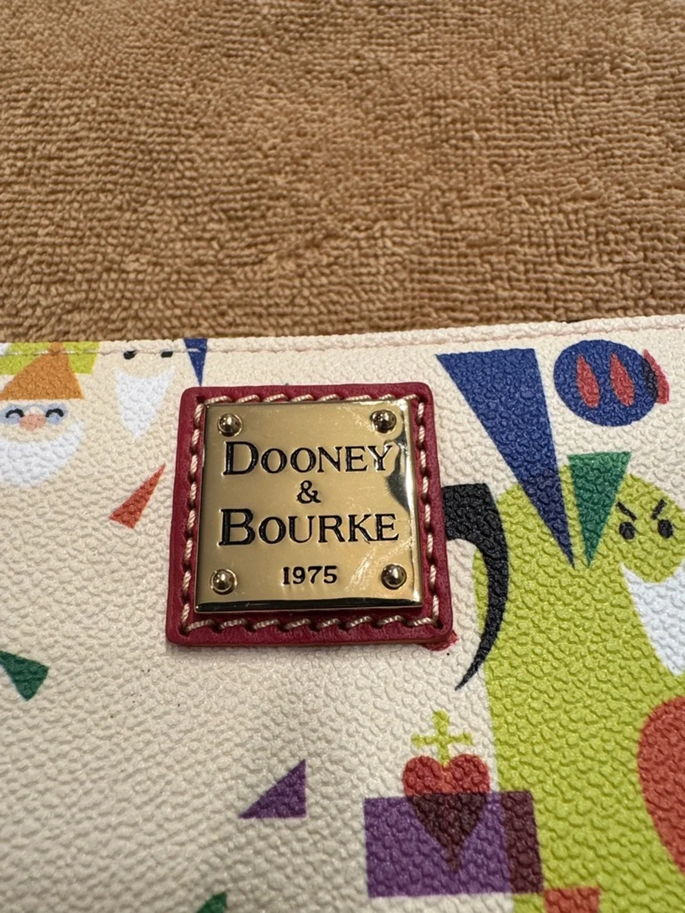 DISNEY SNOW WHITE DOONEY AND BOURKE WRISTLET WALLET